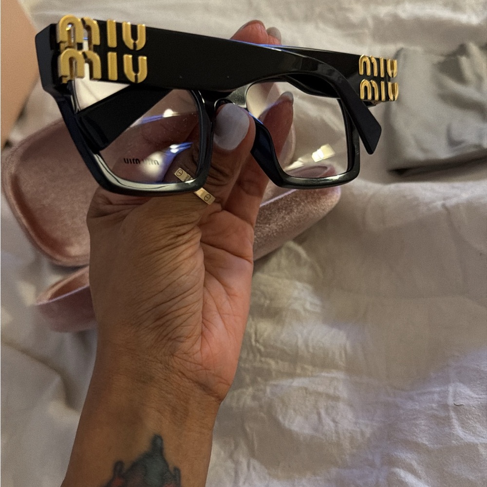 Miu Miu Black and Gold Statement Glasses